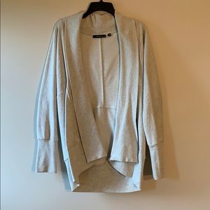 Sweater with studs on the back